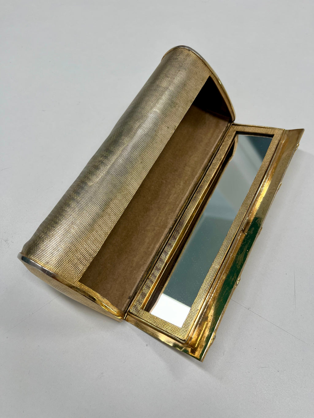 Pochette metallo dorato