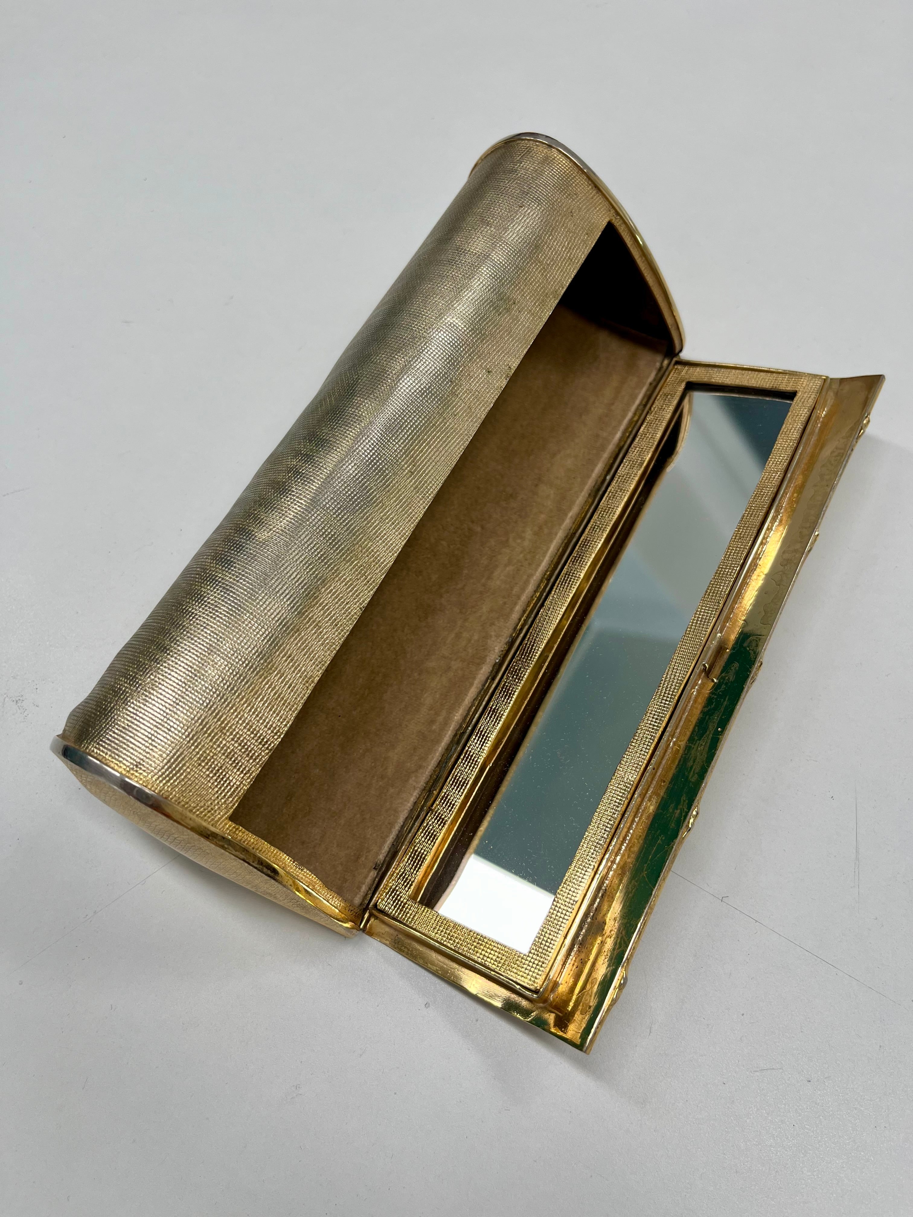 Pochette metallo dorato
