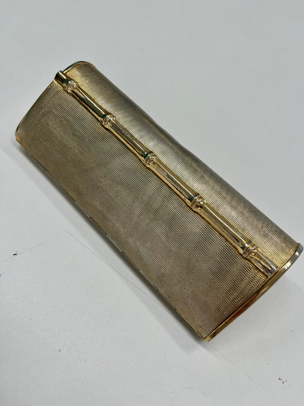 Pochette metallo dorato