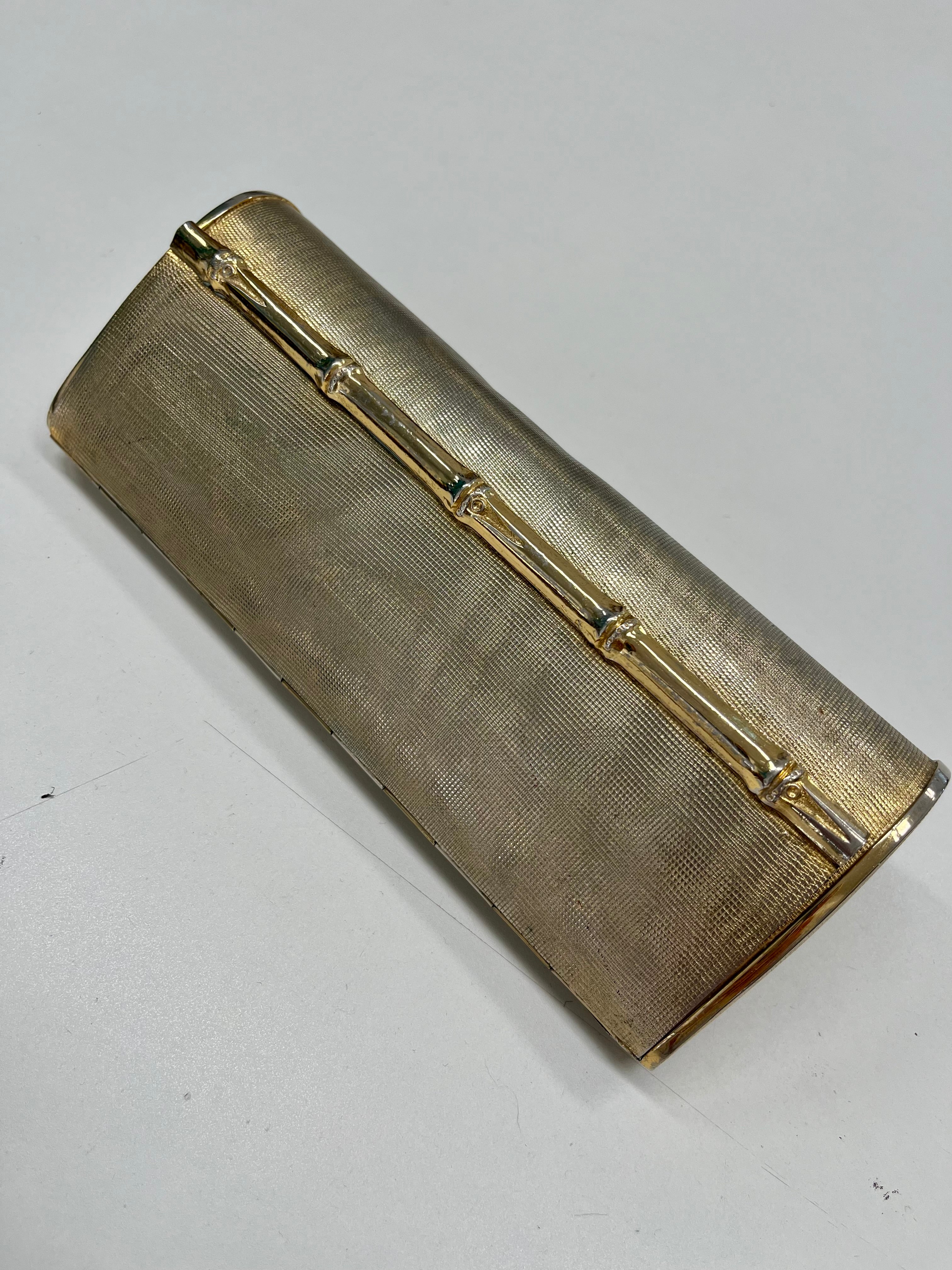Pochette metallo dorato