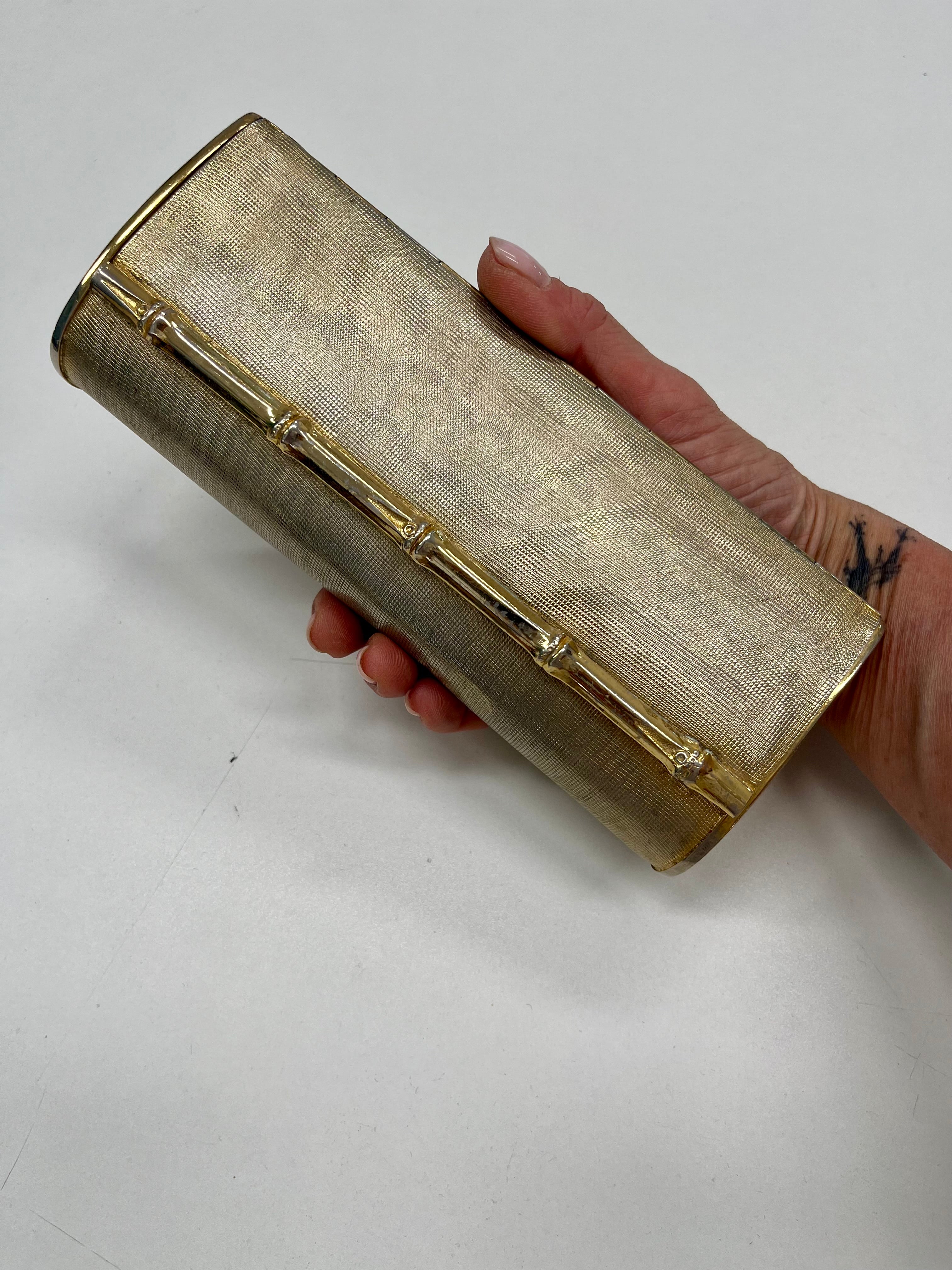 Pochette metallo dorato